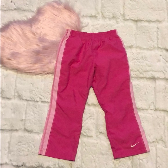 pink nike windbreaker pants